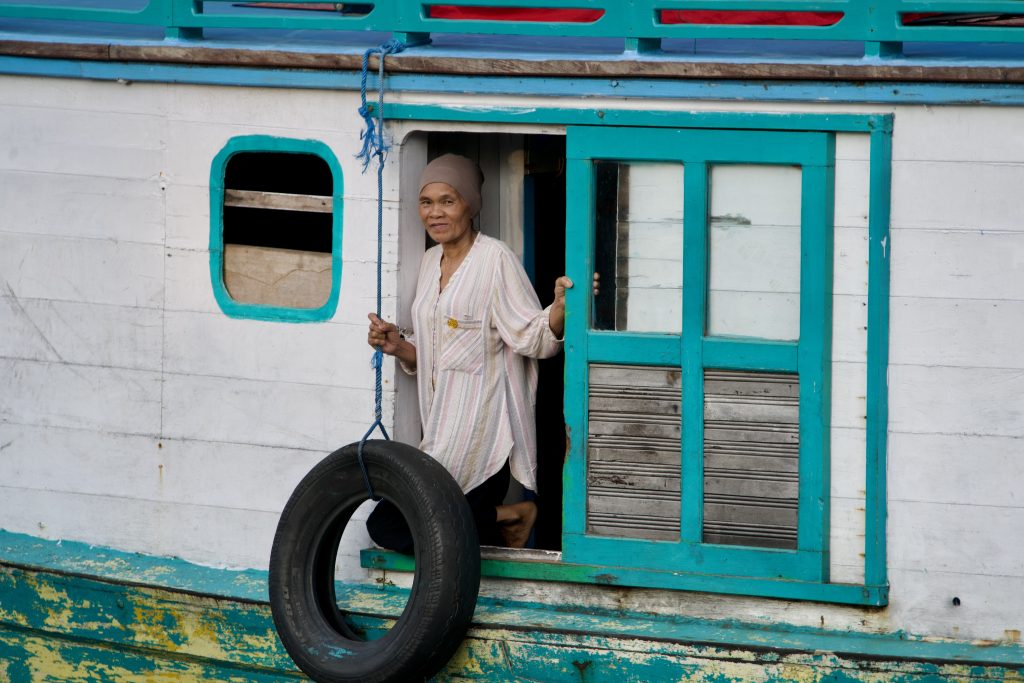 woman door of boat kalimantan borneo indonesia