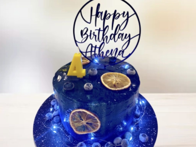 space cake with mirror glaze and lemon blueberry filling